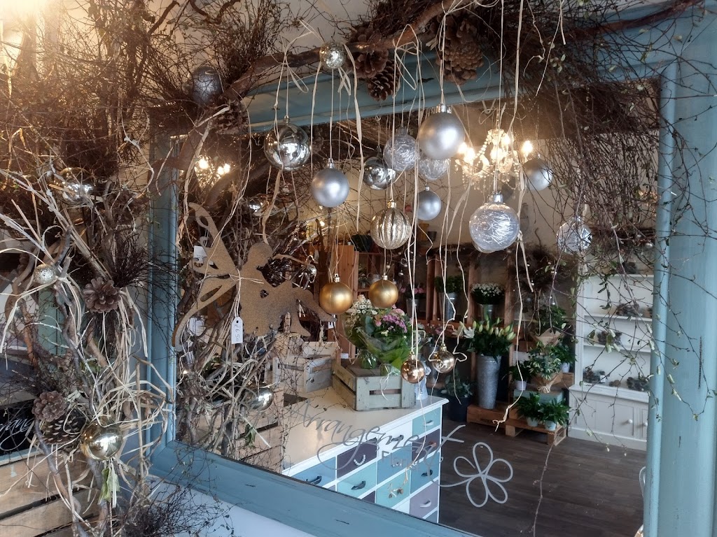 By Arrangement Florists