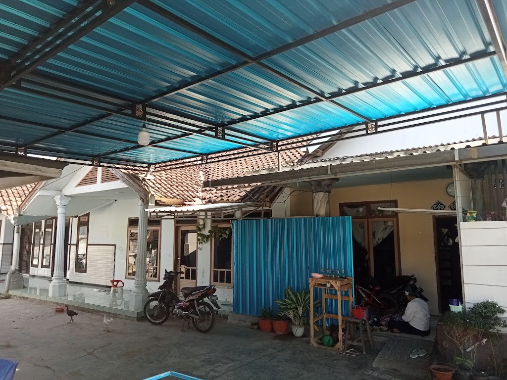 Ikmal bengkel tunggal putra