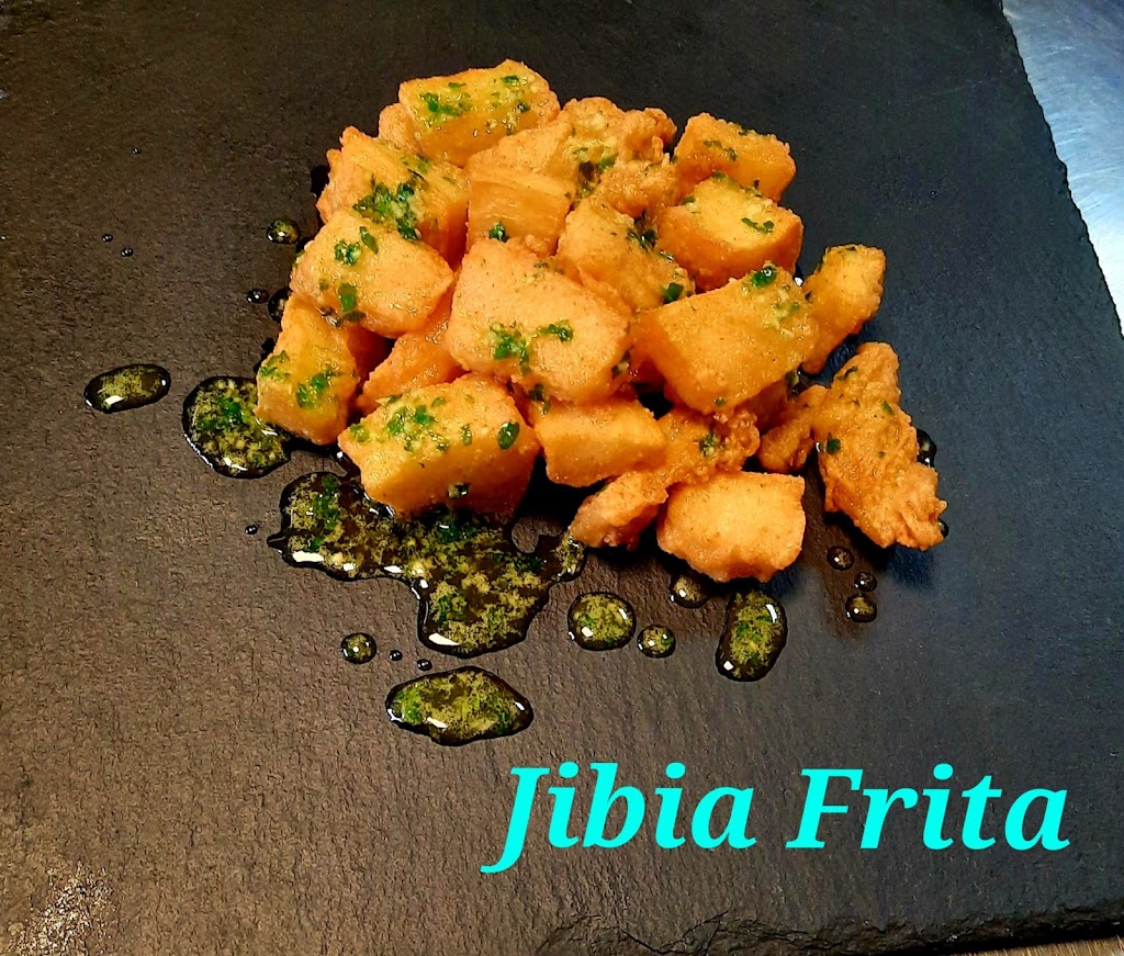 Asador de Pollos y Comidas Preparadas