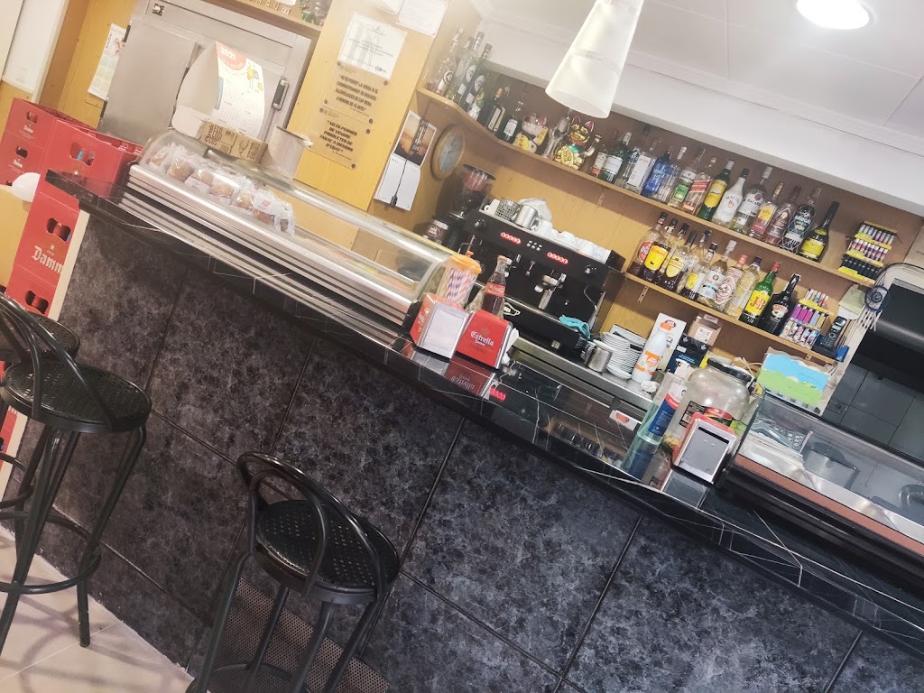 Bar y punto — Ambiente