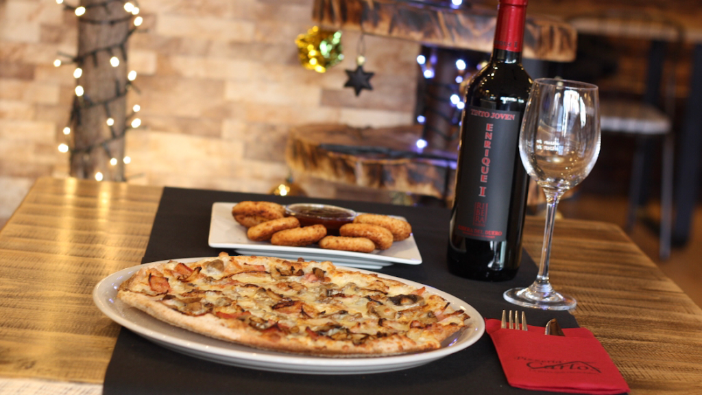 Pizzeria Carlos El Prat — Comida y bebida
