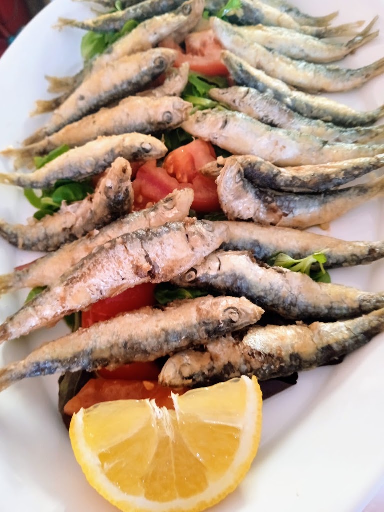 La Cantina del Muelle — Comida y bebida