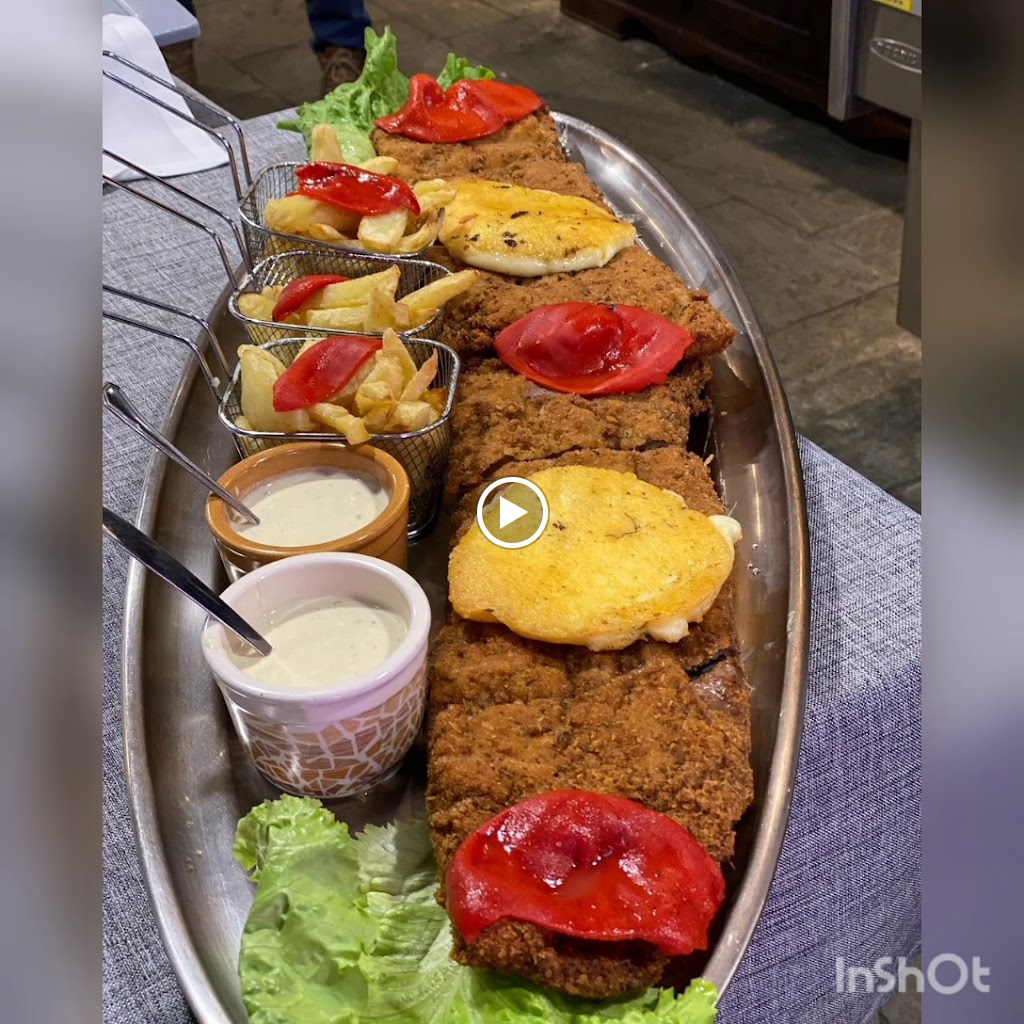 Restaurante Sidreria El Llavianu — Videos