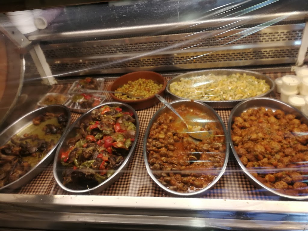 La Rostisseria de Can Vidalet — Comida y bebida