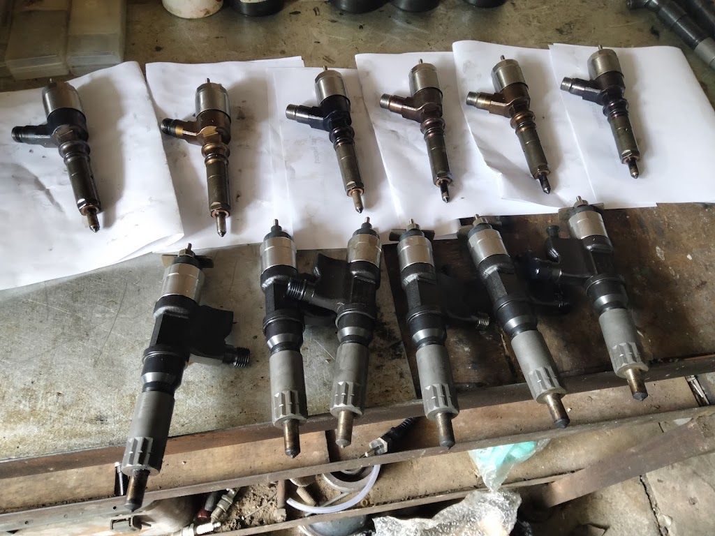 Otomotif makassar. Servis injektor dan ecu mobil