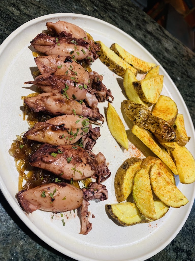 Asador - Bar Habelas Hailas — Comida y bebida