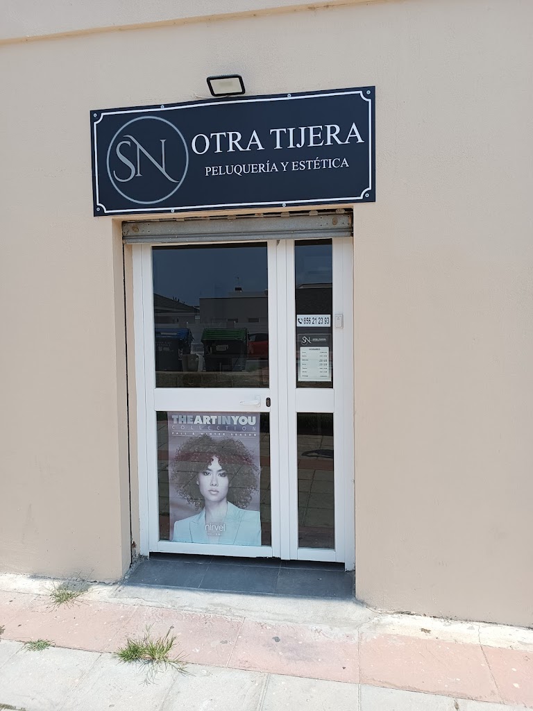 Peluqueria Otra tijera