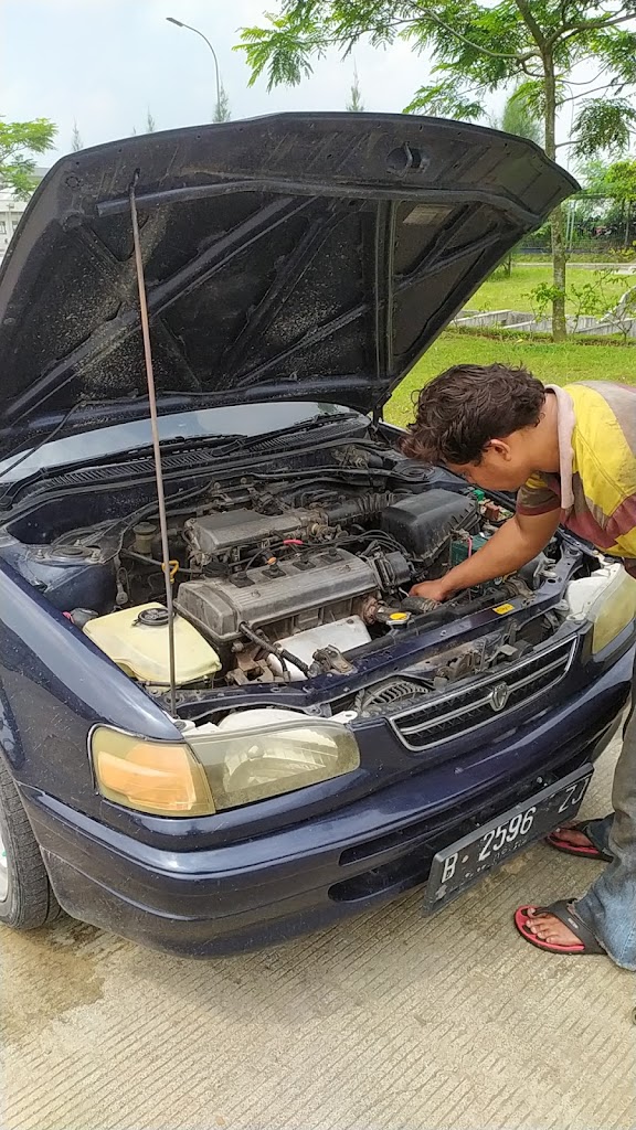 BENGKEL MOBIL UNYIL