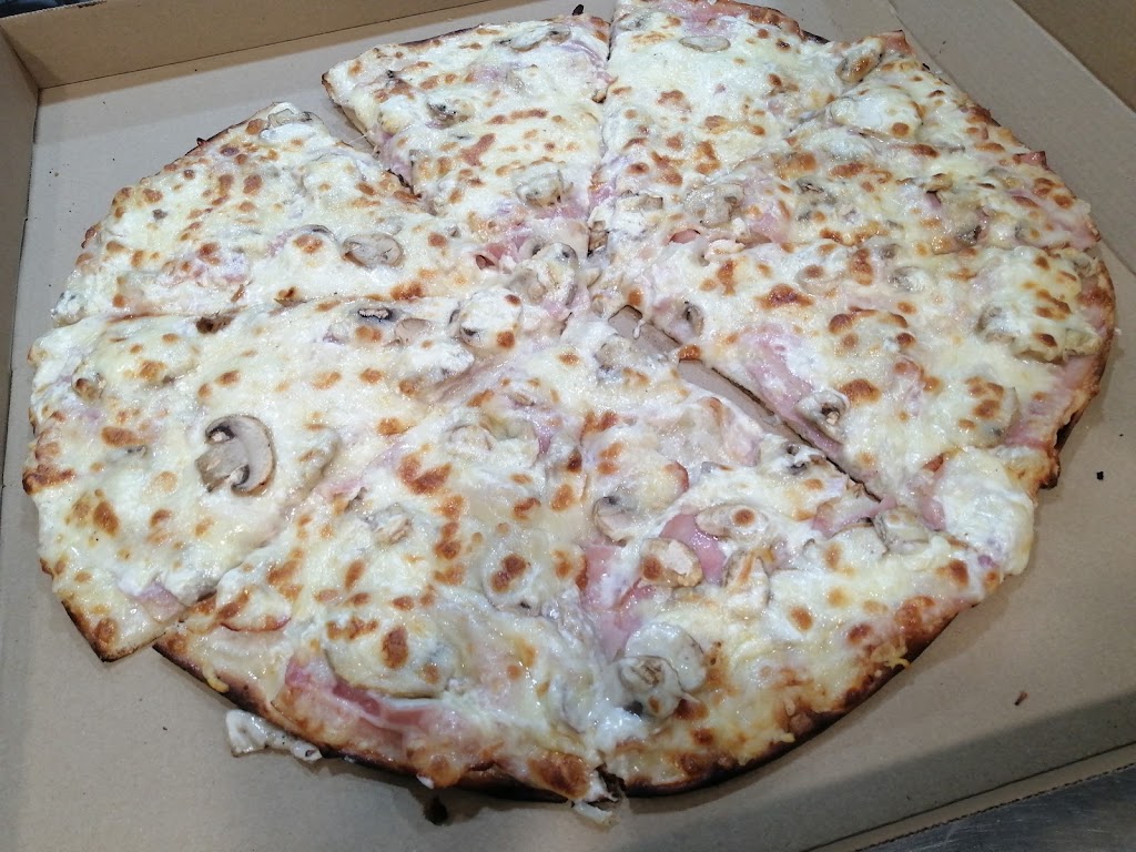 TREVI Pizzeria — Comida y bebida