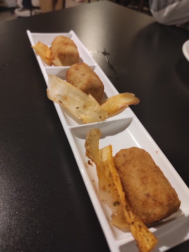 La Santa Taberna — Comida y bebida