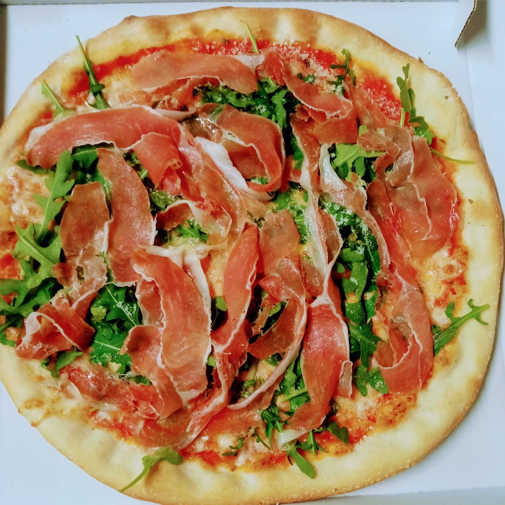 Es Clot Restaurante Pizzeria — Comida y bebida
