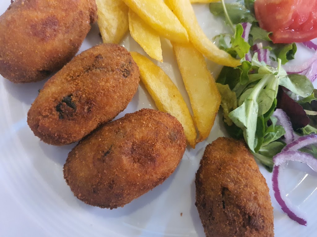 Restaurante El Anticuario — Comida y bebida
