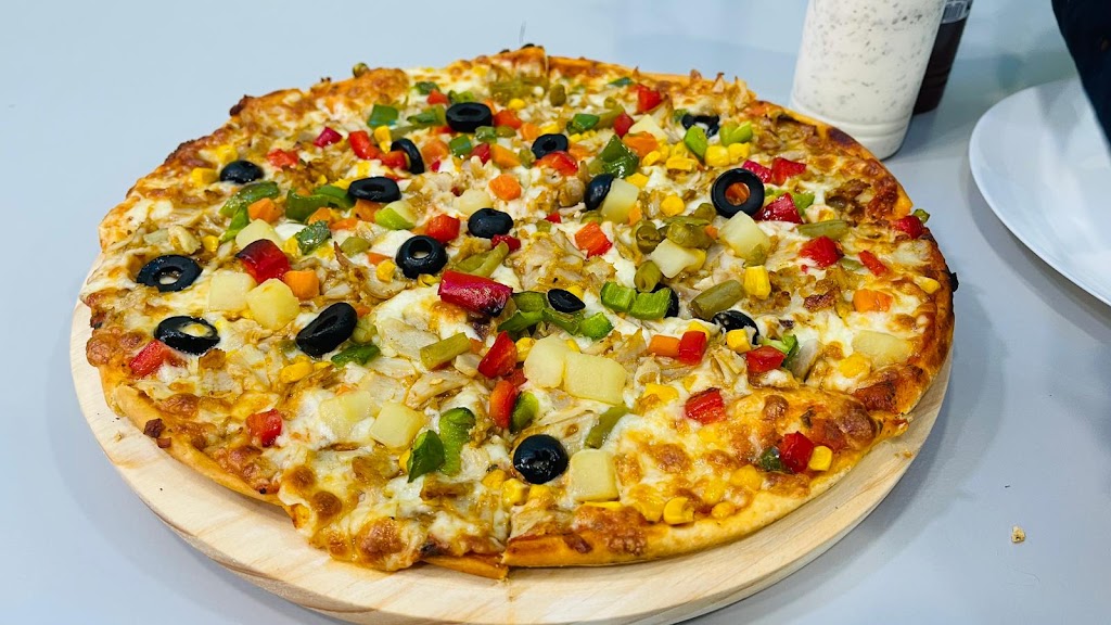 Welcome Bar kebab pizza — Comida y bebida