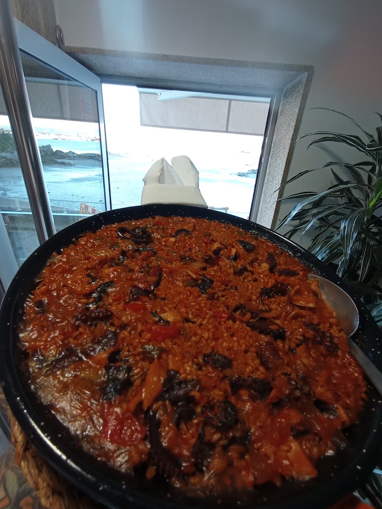 EVITA RESTAURANTE — Paella