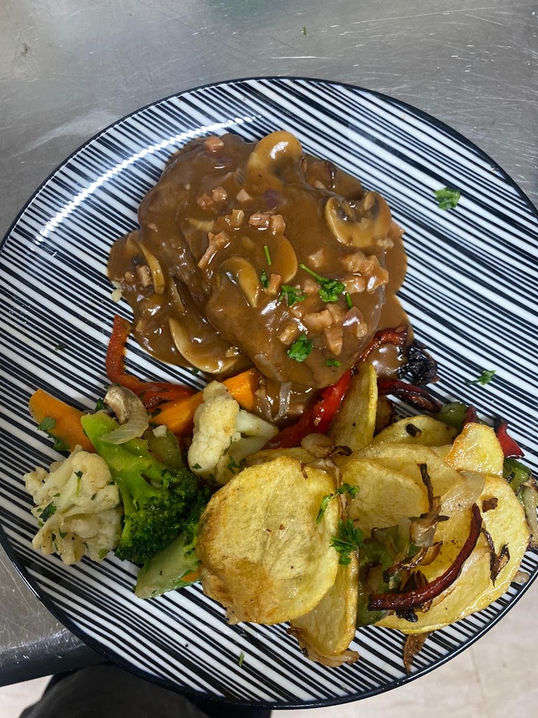 El Guanche Grill — Comida y bebida