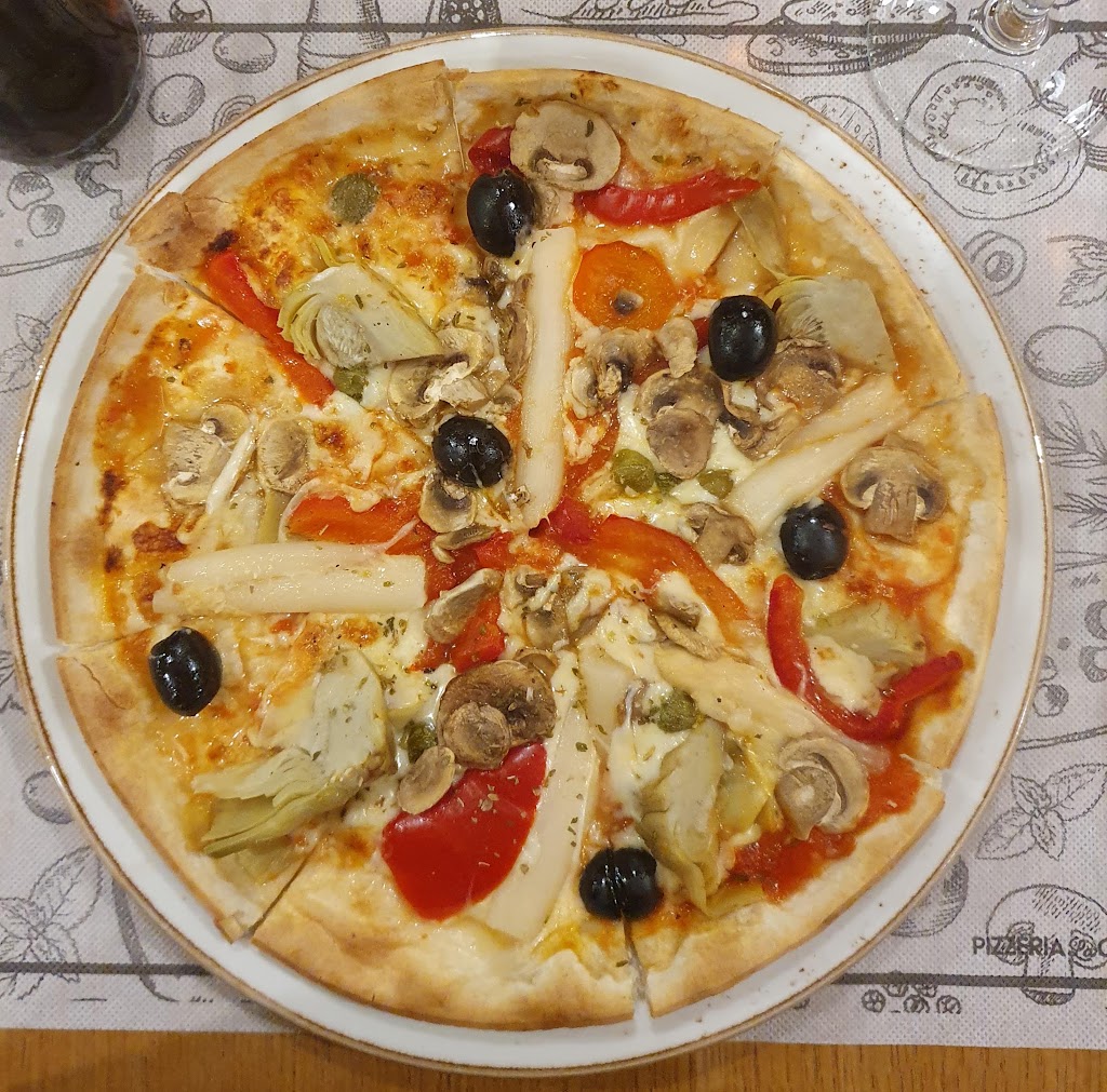 Pizzeria La Competencia — Comida y bebida