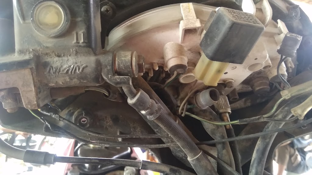 bengkel motor 27 " pitulikur "