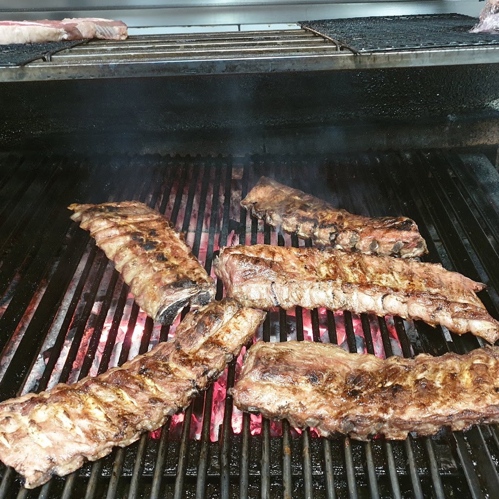 Parrilla La Zaranda — Comida y bebida