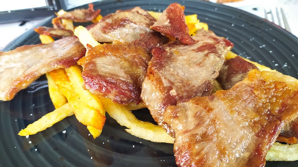 Bar Tienda Nueva — Comida y bebida