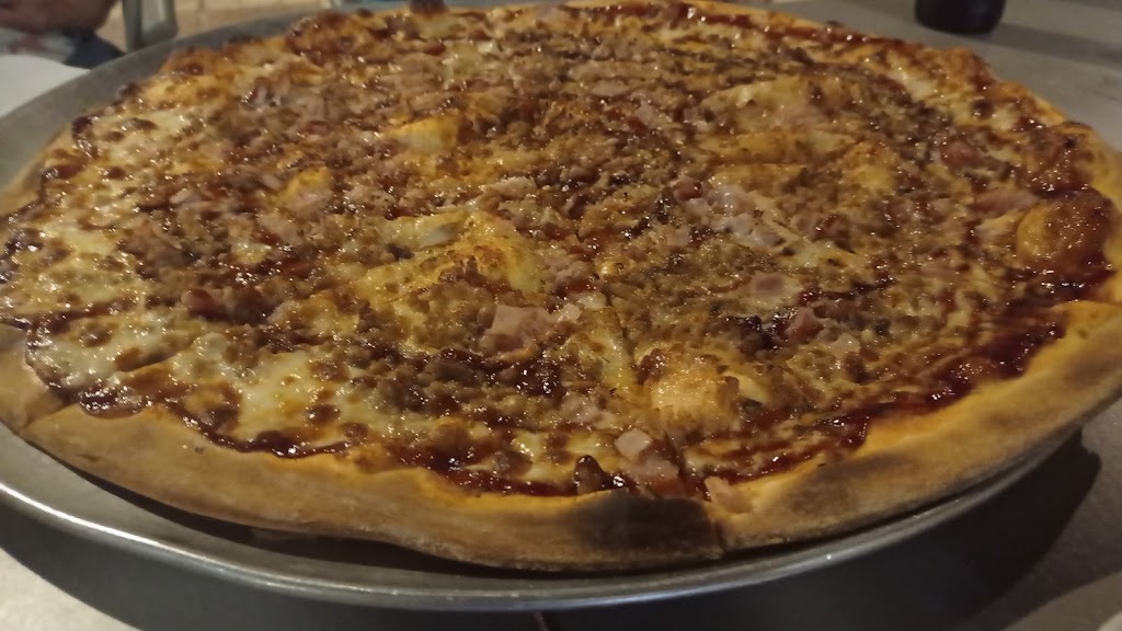 Restaurante - Pizza Gigante — Comida y bebida