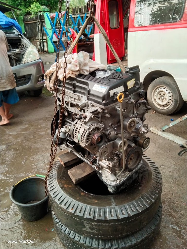 Celsi motor bengkel mobil