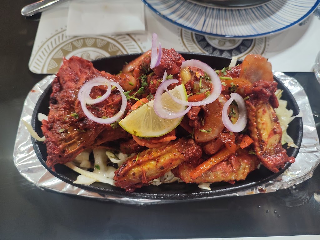 The Curry Gardens — Comida y bebida