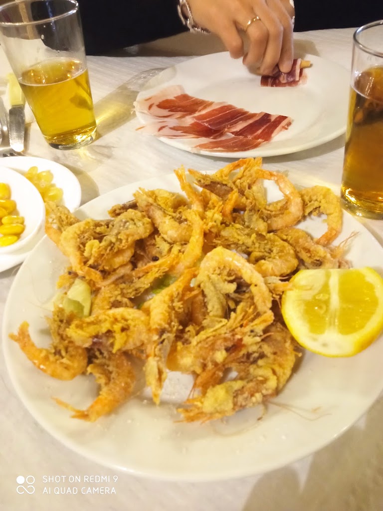Bar Amigos de las Sevillanas — Comida y bebida
