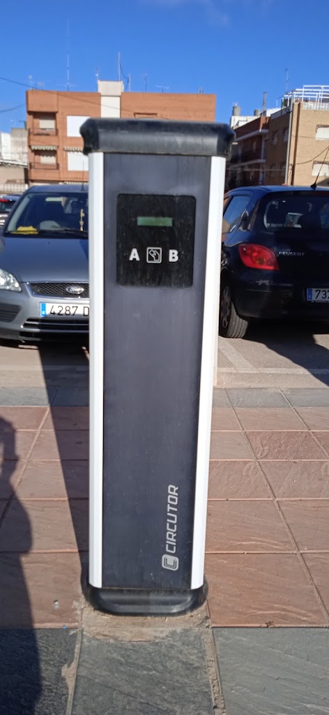 Recarga coche E — Estacionamiento
