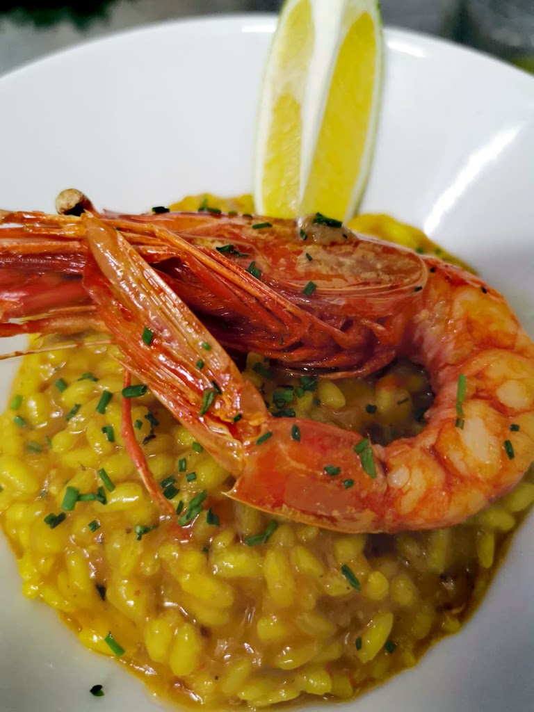Alundra Tapas — Comida y bebida