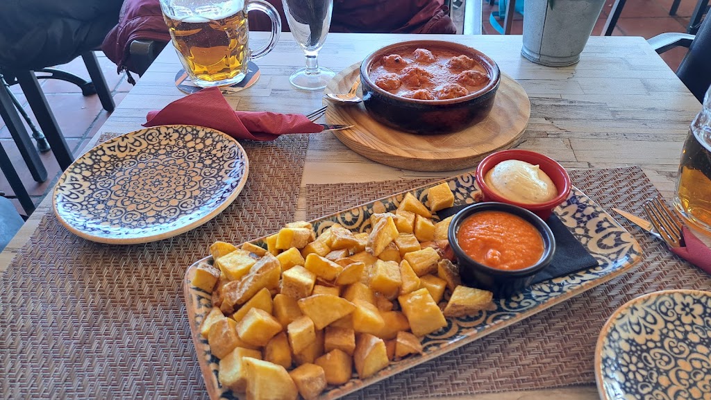 Taverna Octopus — Comida y bebida
