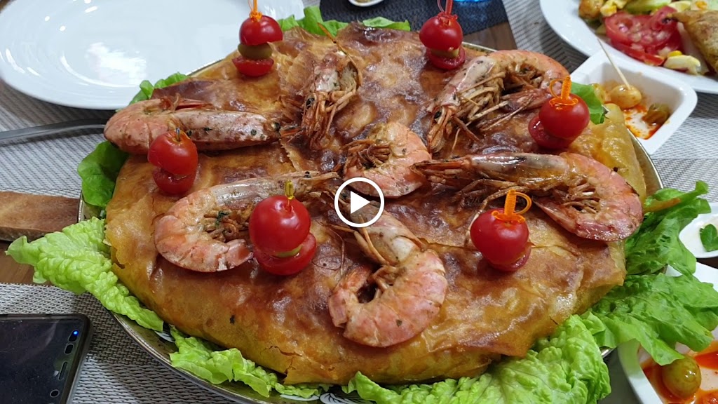 Restaurante arabe ALJAIMA — Videos