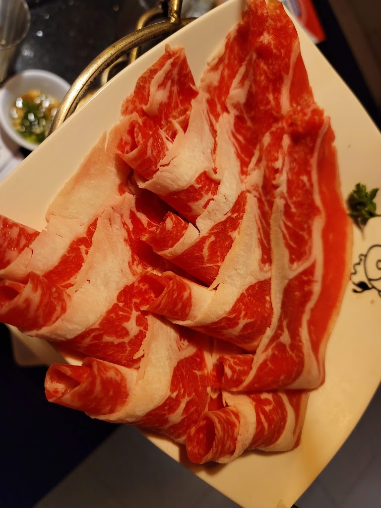 小蒙牛頂級麻辣養生鍋-屏東店 的照片