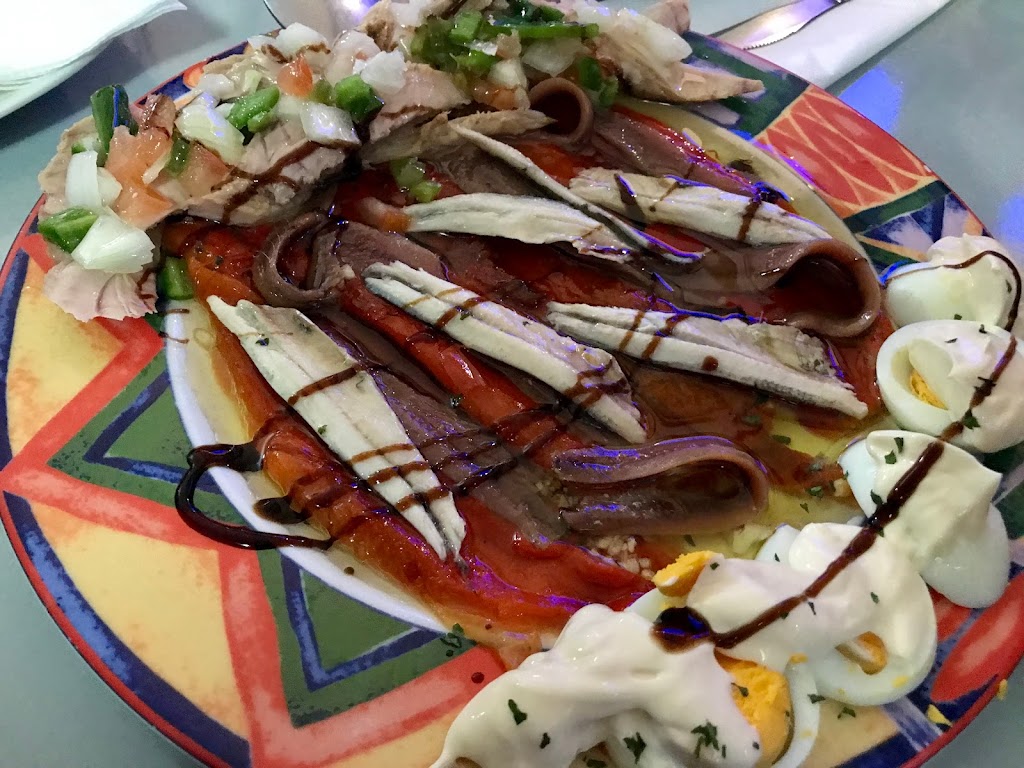 Bar Tainos — Comida y bebida