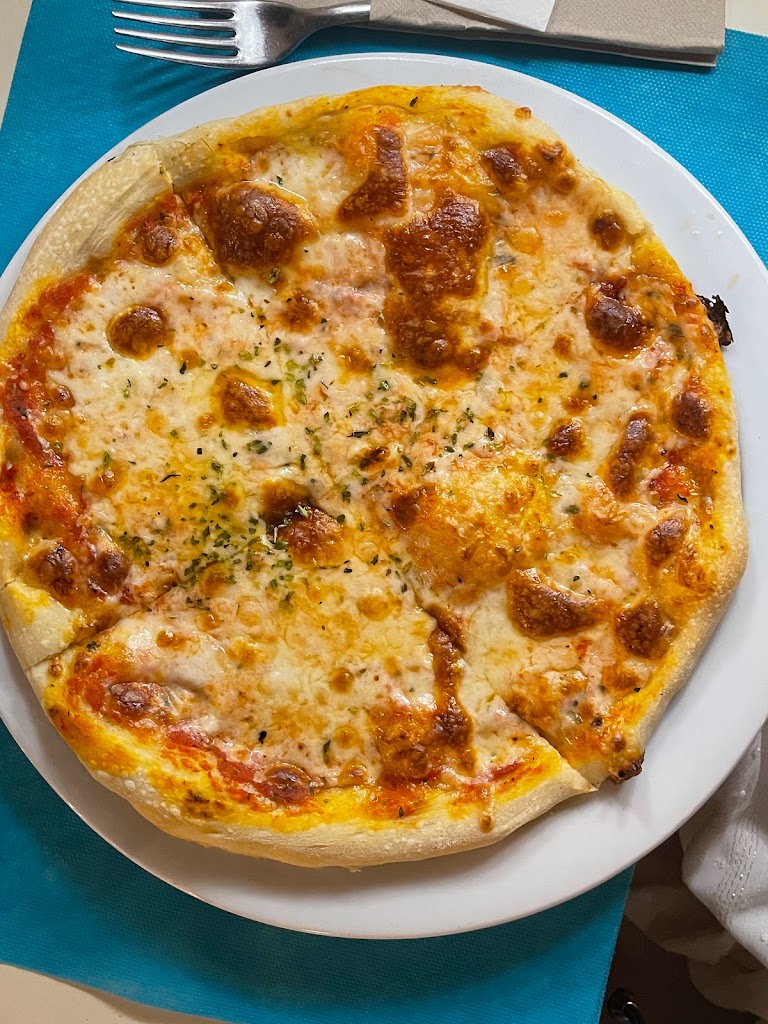 EXOTIC restaurante & cocktails. — Pizza