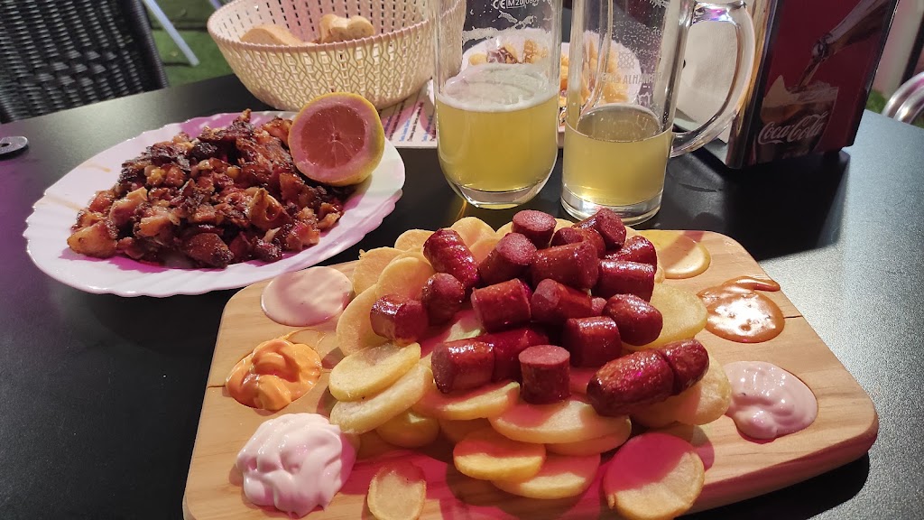 La taberna de Roxana Raciones — Comida y bebida