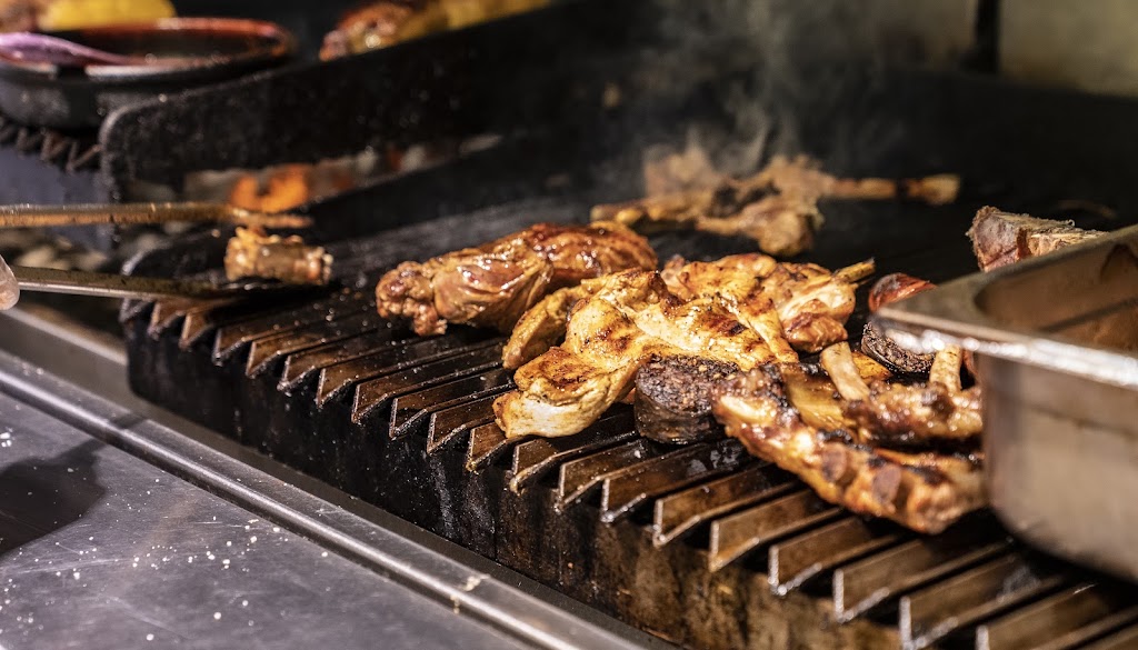 Restaurante Al Punto Rivas: carnes, pescados y asador — Comida y bebida