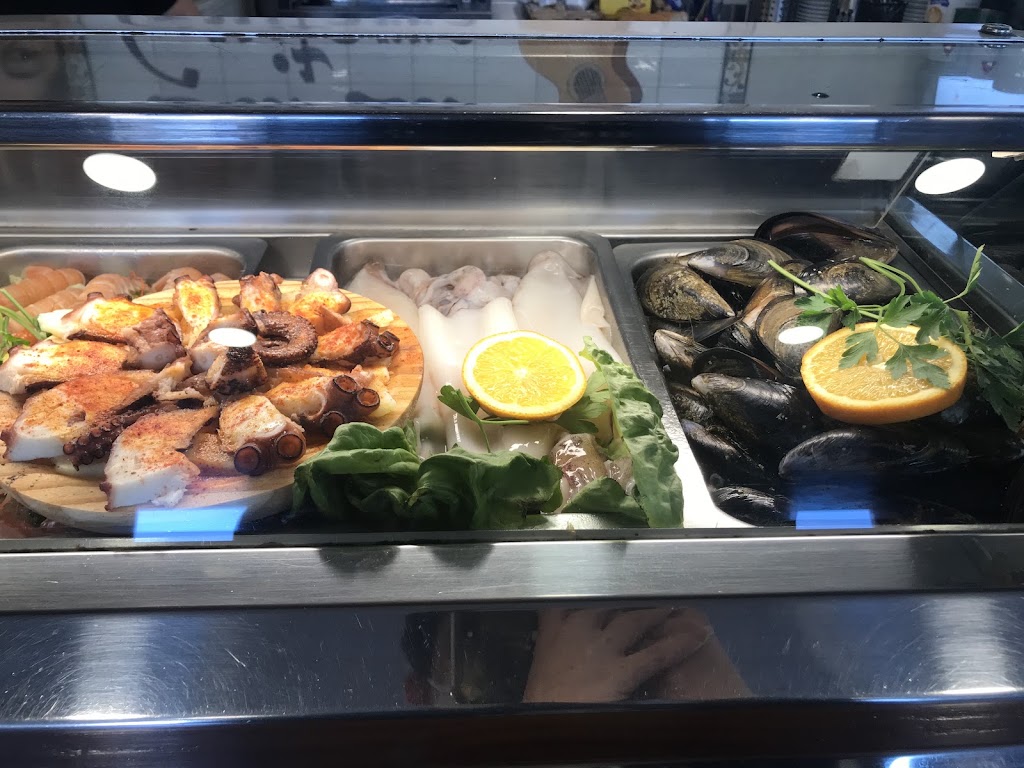 Bar La Guitarra — Comida y bebida