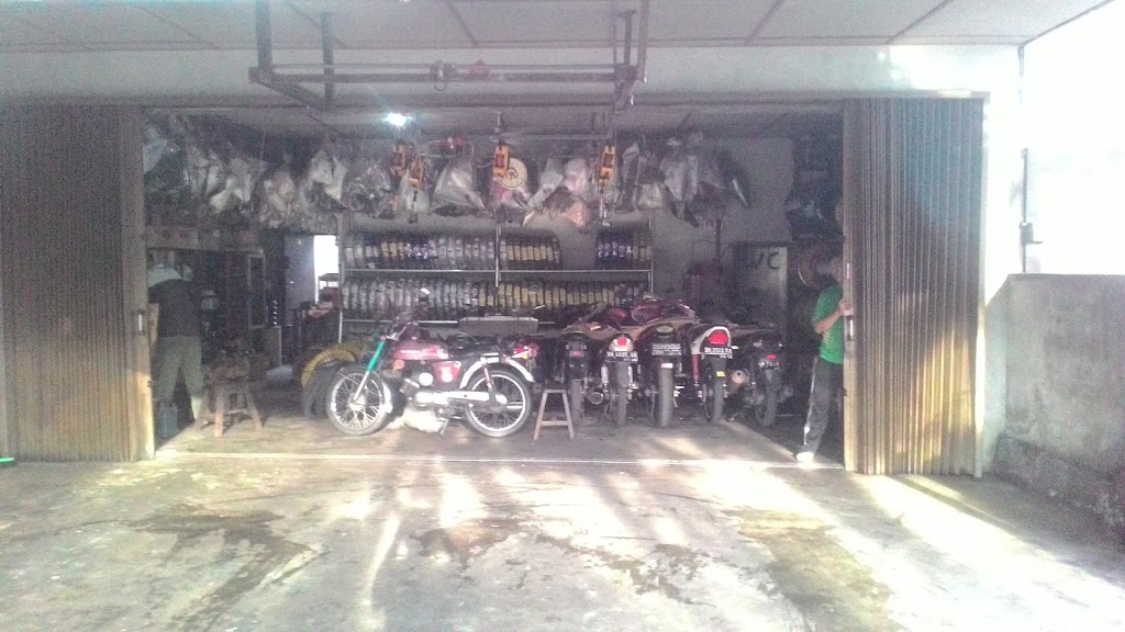 Bengkel Ahap Motor: Solusi Terpercaya untuk Perawatan dan Perbaikan Motor Anda di Sungailiat