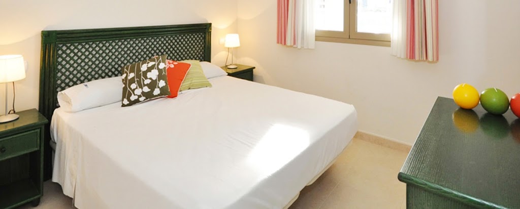 Apartamentos Larimar | Unitursa — Habitaciones