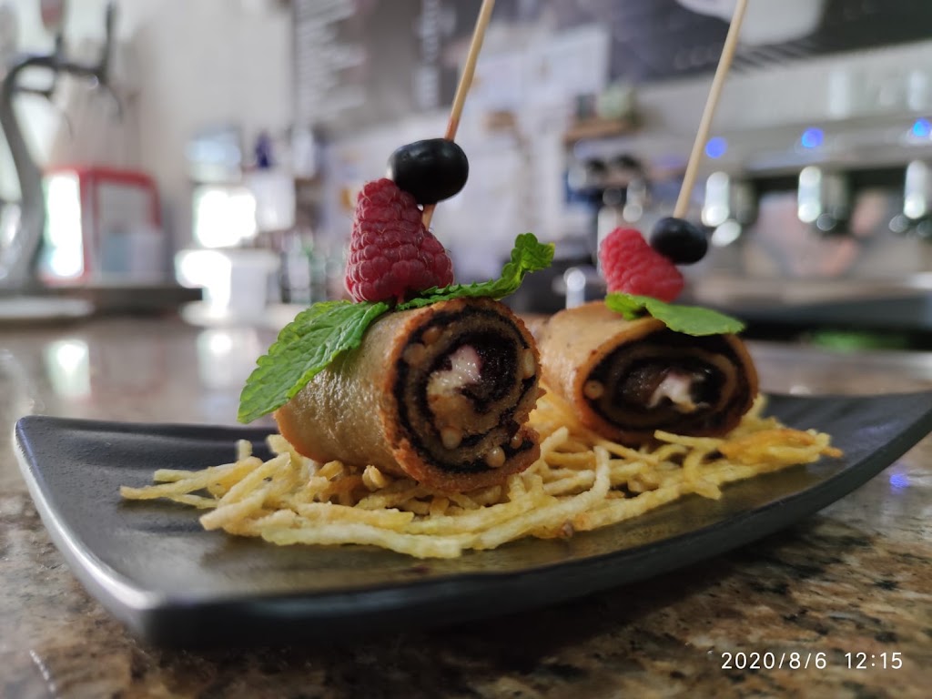 Bar Cafeteria "Los Robles" — Comida y bebida