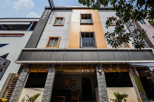 Oyo Varsha Grand Residence