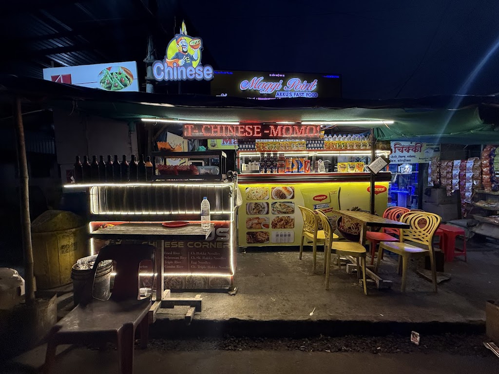 Maggie points Akku's fast food