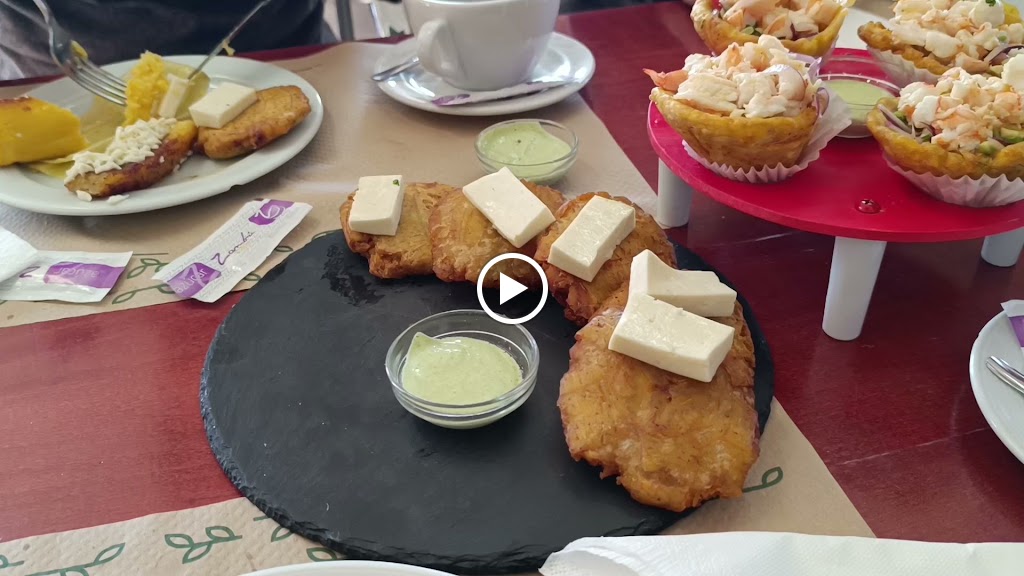 Restaurante El Tata — Videos
