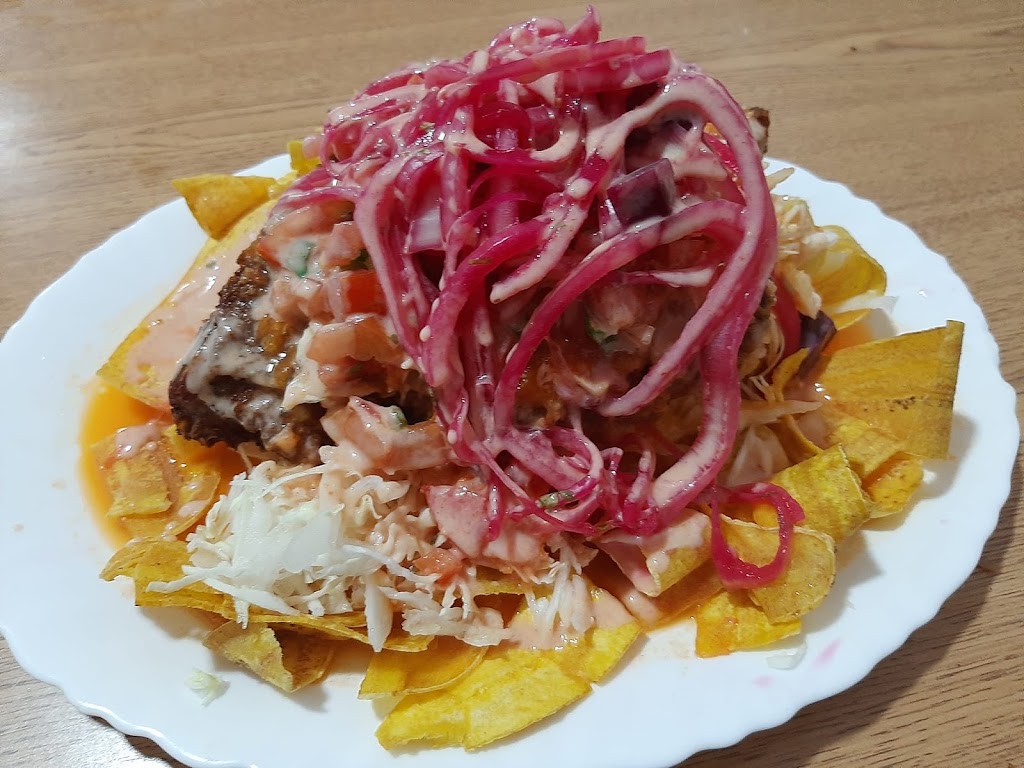 Asador K.F.M — Comida y bebida