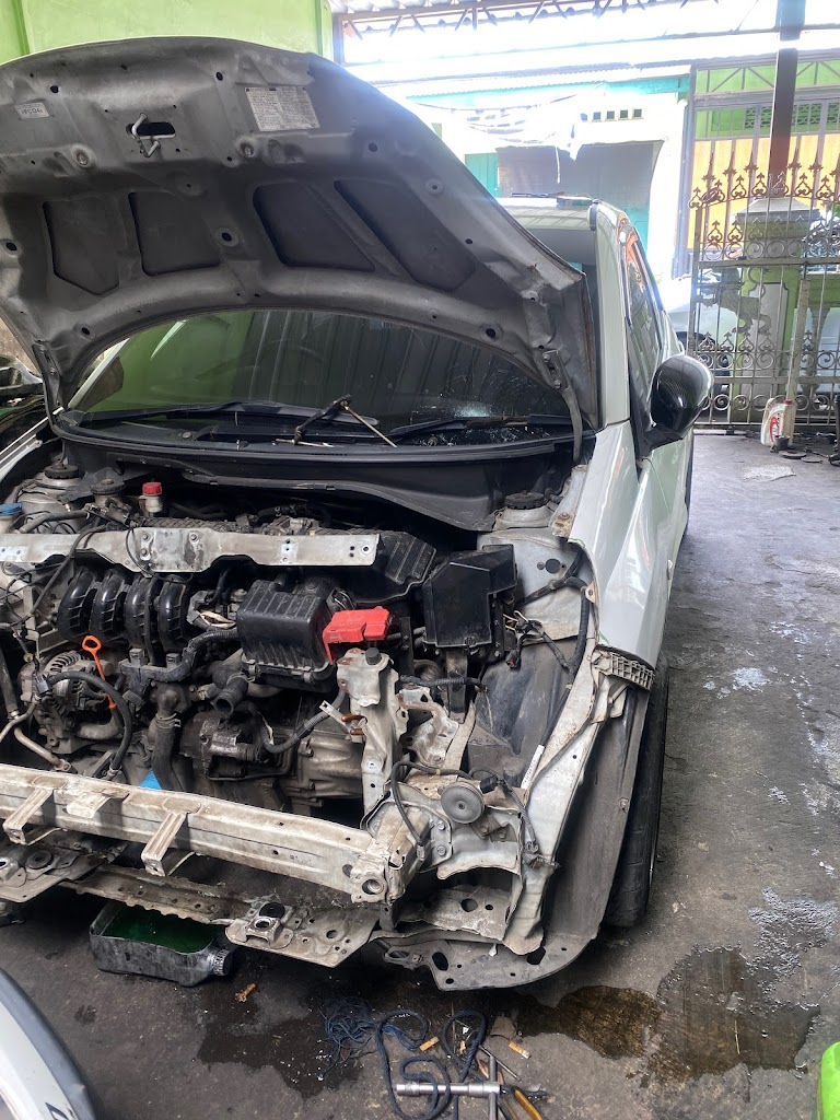 Bengkel mobil pak guru Anugerah