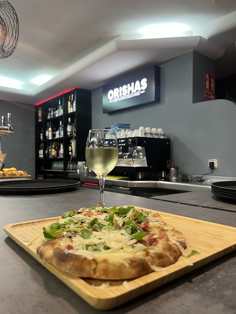 Orishas Restaurante — Comida y bebida