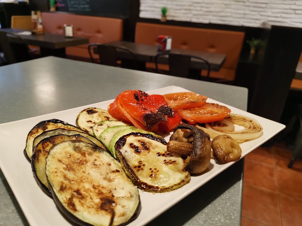 Milagros Bar & Tapas Cerveceria — Comida y bebida