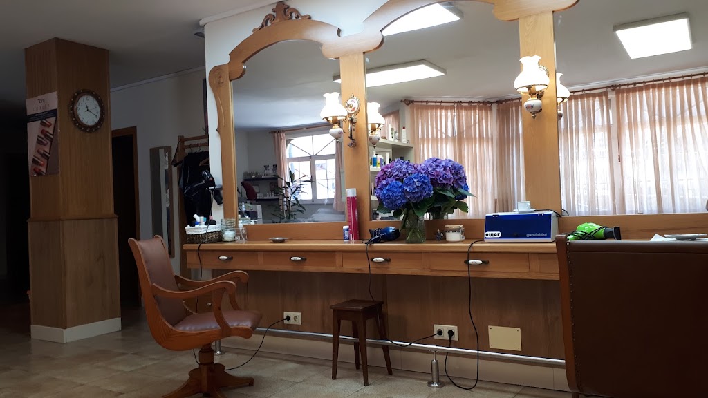 Peluqueria Cabelinos — Interior