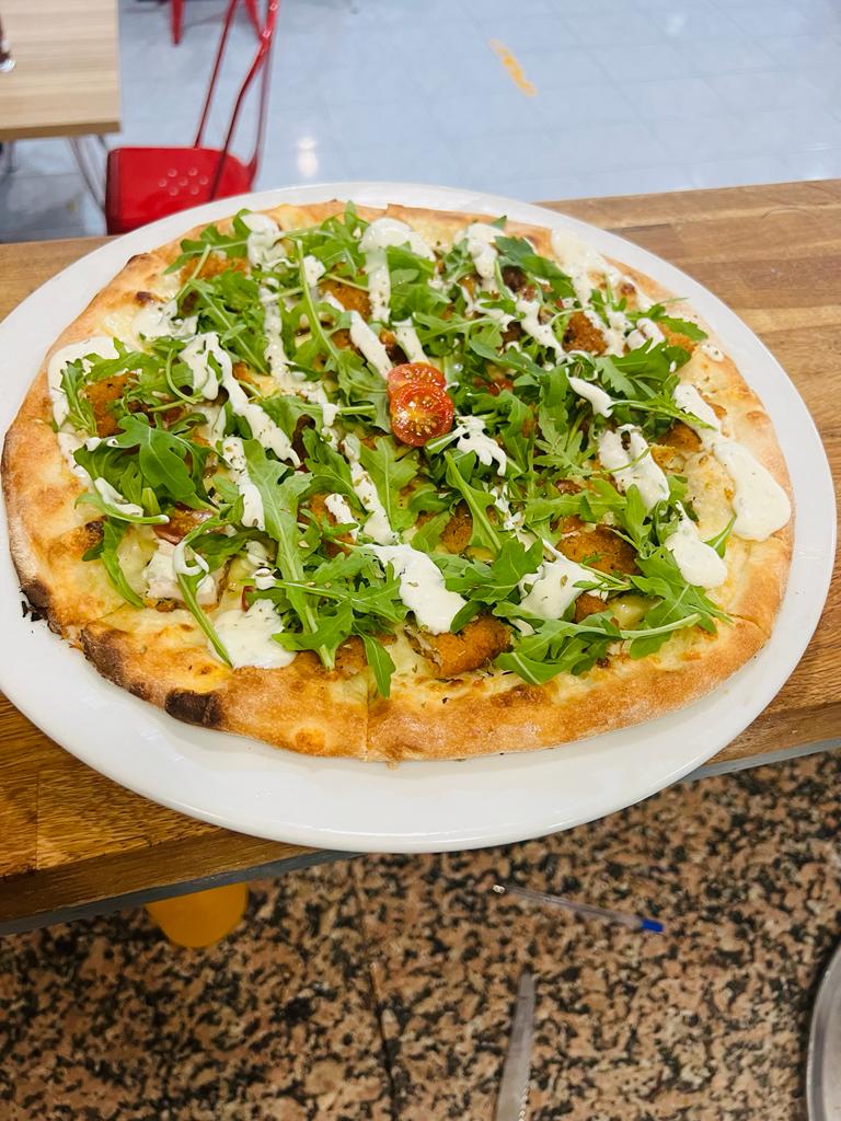 pizzeria prit — Comida y bebida