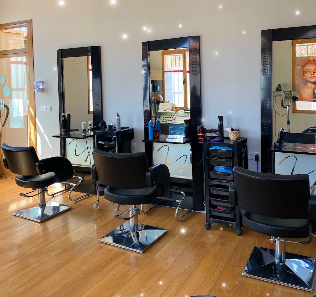 Mima-T Salon De Peluqueria — Interior